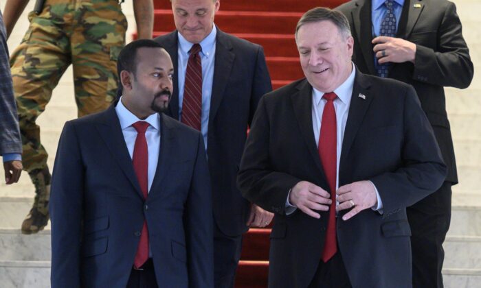 Secretary of State Mike Pompeo walks with Ethiopian Prime Minister Abiy Ahmed at the Prime Minister office after a meeting in Addis Ababa, Ethiopia, on Feb. 18, 2020. (Andrew Caballero-Reynolds/Pool via Reuters)