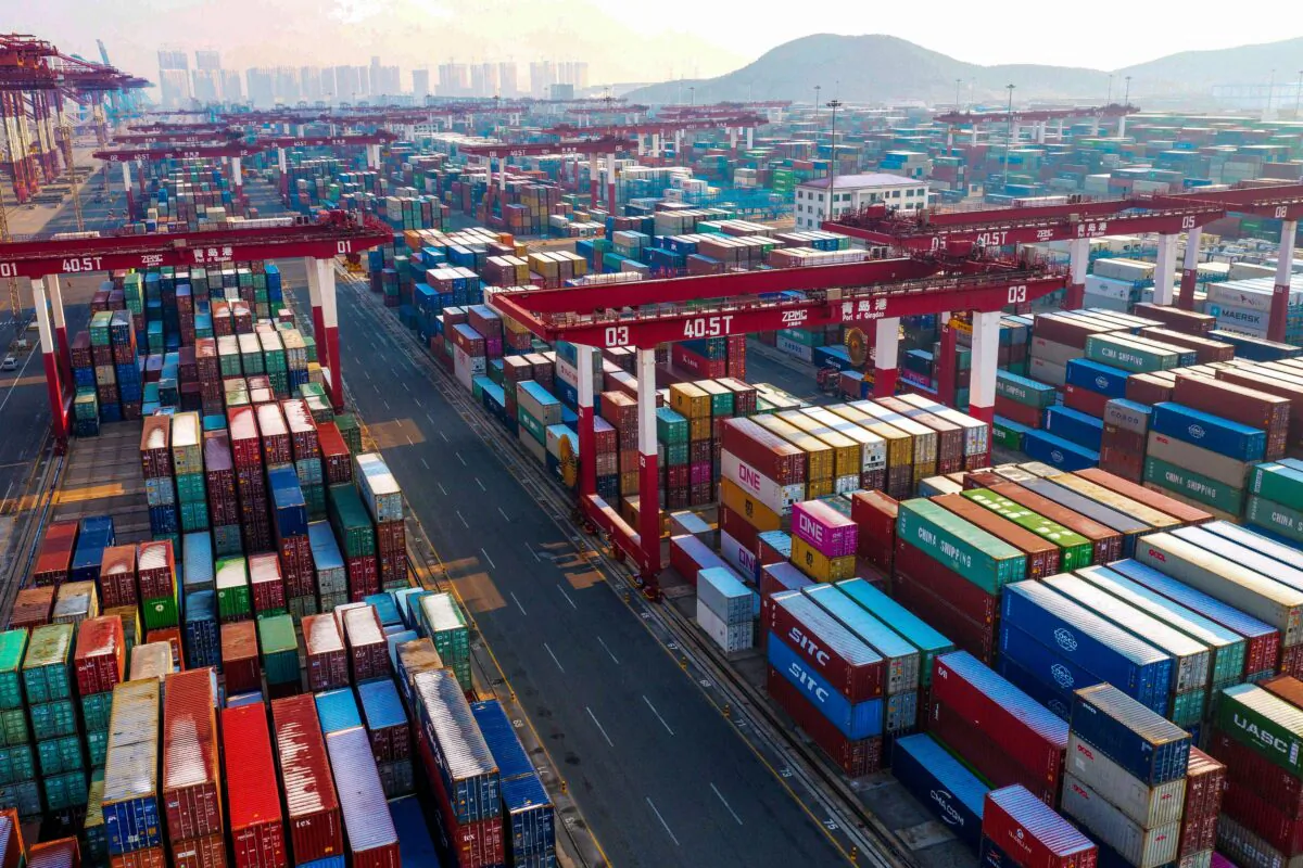 Containers are seen stacked at a port in Qingdao in China's eastern Shandong Province on Jan. 14, 2020. (STR/AFP via Getty Images)