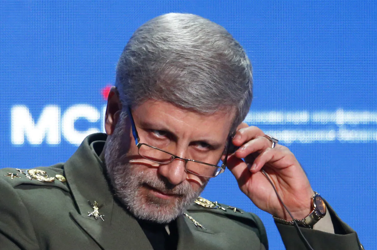 Iranian Defence Minister Amir Hatami adjusts a headphone during the annual Moscow Conference on International Security (MCIS) in Moscow, Russia, on April 4, 2018. (Sergei Karpukhin/Reuters)