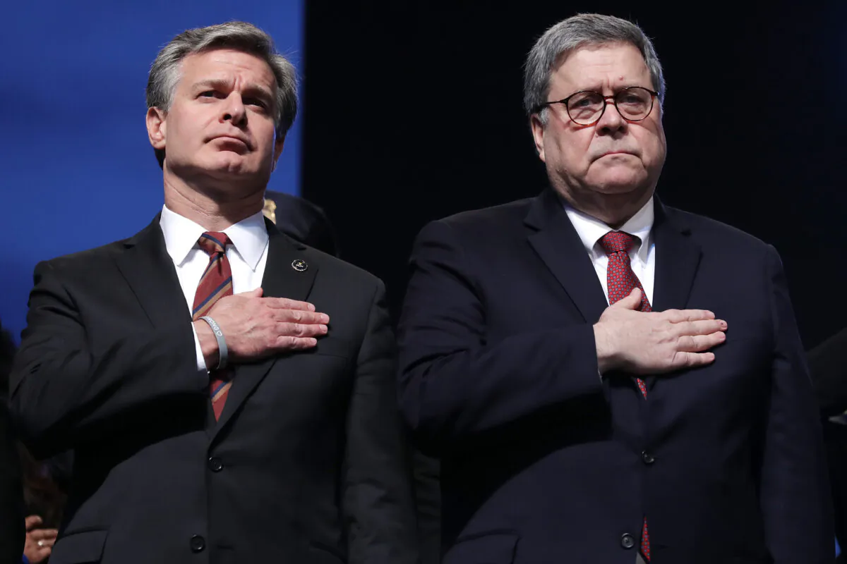 FBI Director Christopher Wray, left, and Attorney General William Barr in Washington on May 13, 2019. (Chip Somodevilla/Getty Images)