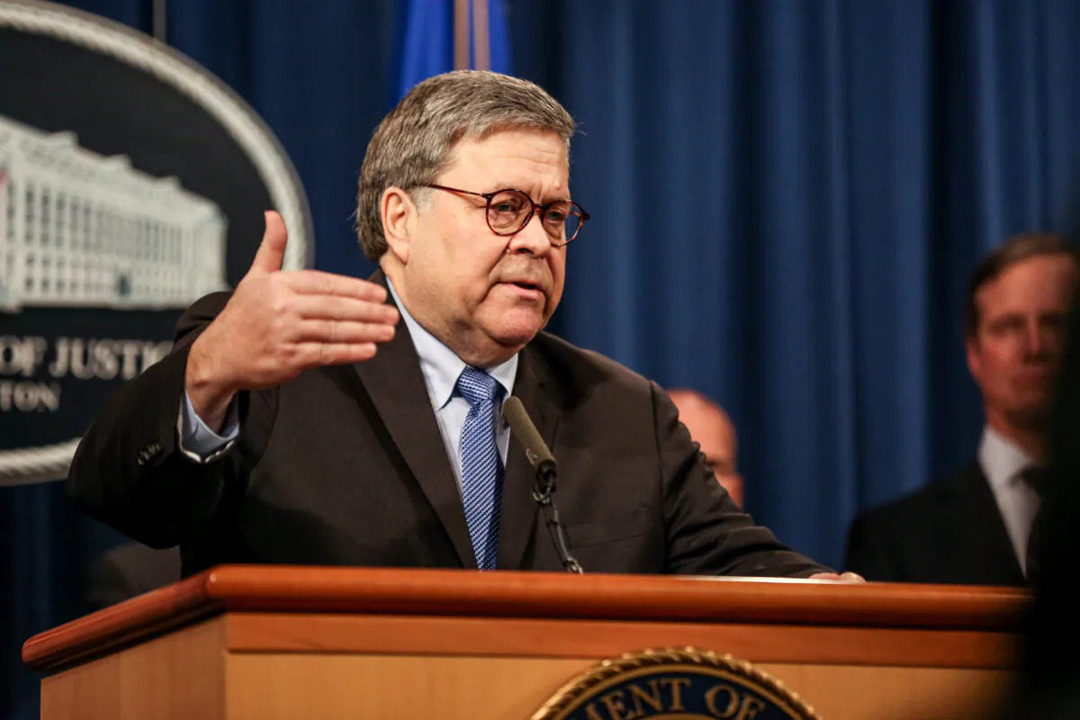 Attorney General Bill Barr and justice officials hold a press conference at the Justice Department in Washington on Jan, 13, 2020. (Charlotte Cuthbertson/The Epoch Times)