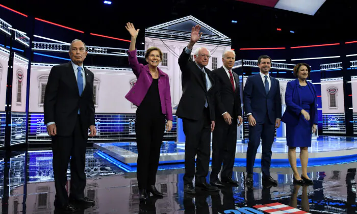 Democratic presidential candidates (L-R) former New York City Mayor Mike Bloomberg, Sen. Elizabeth Warren (D-Mass.), Sen. Bernie Sanders (I-Vt.), former Vice President Joe Biden, former South Bend, Indiana Mayor Pete Buttigieg, and Sen. Amy Klobuchar (D-Minn.) arrive on stage for the Democratic presidential primary debate in Las Vegas, Nev., on Feb. 19, 2020. (Ethan Miller/Getty Images)