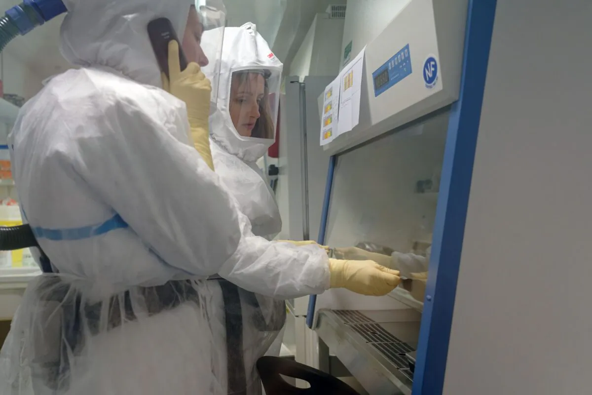 French researchers working on the new coronavirus at the Pasteur Institute of Lille on Feb. 20, 2020. (Sylvain Lefevre/Getty Images)