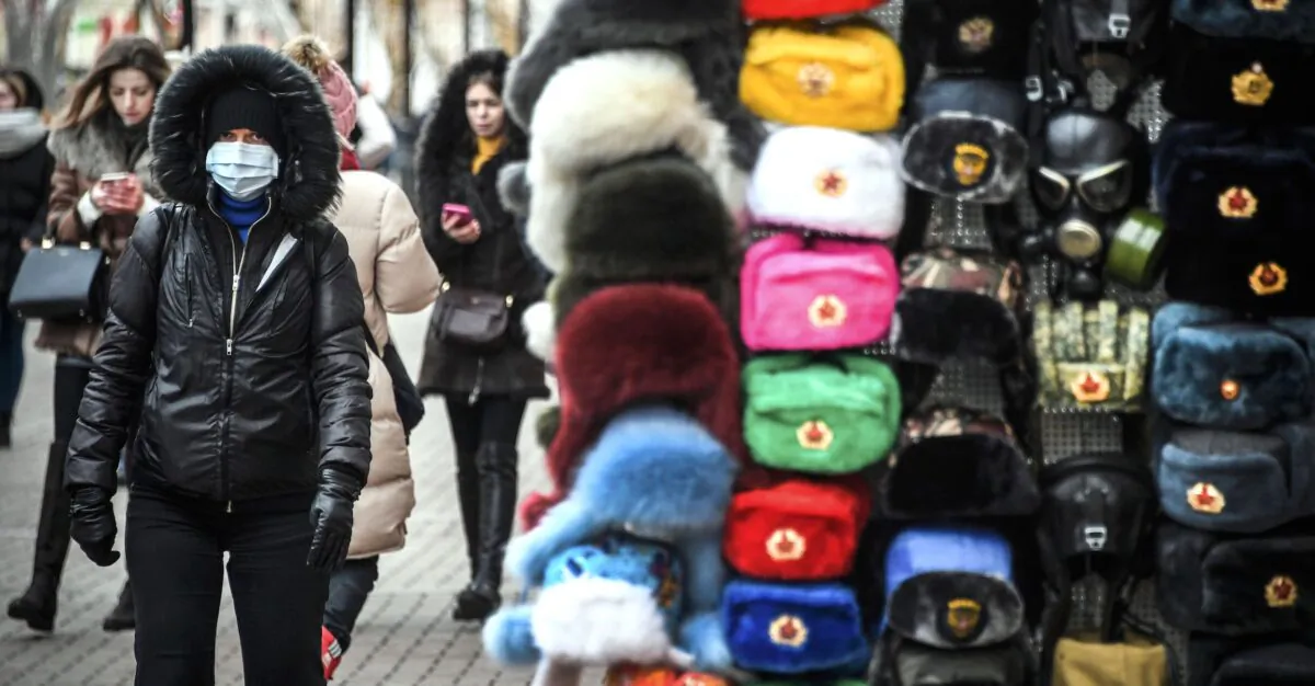 A person wearing a face mask walks along Arbat street in downtown Moscow on Feb. 19, 2020. (Alexander Nemenov/AFP via Getty Images)