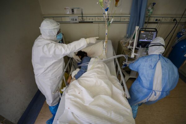 Medical workers in protective suits