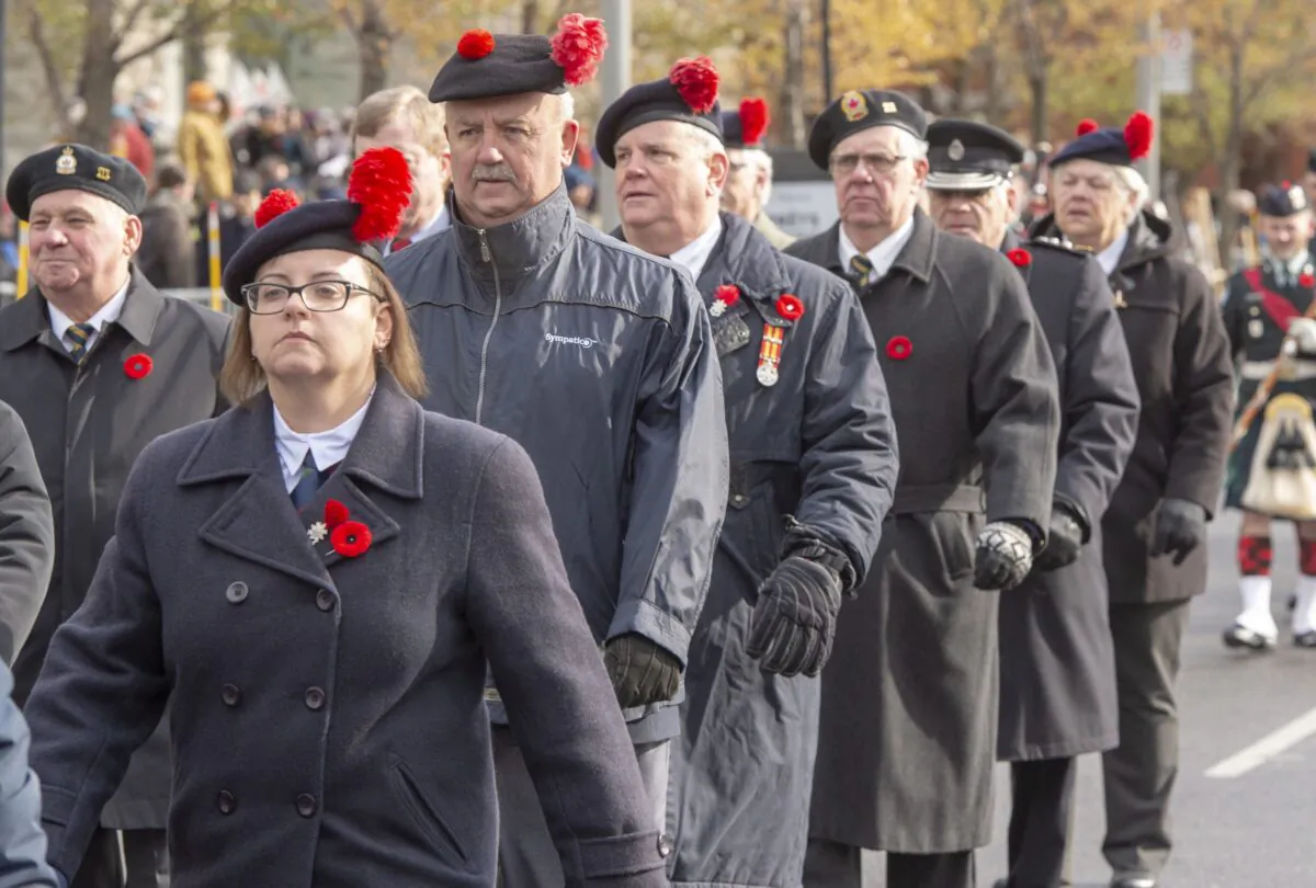 Veterans march during Remembrance Day ceremonies in Montreal on Nov. 11, 2019. Veterans ombudsman Craig Dalton is calling for nationwide consultations to develop what he says is a much-needed vision and plan for supporting former service members and their families.  (The Canadian Press/Ryan Remiorz)