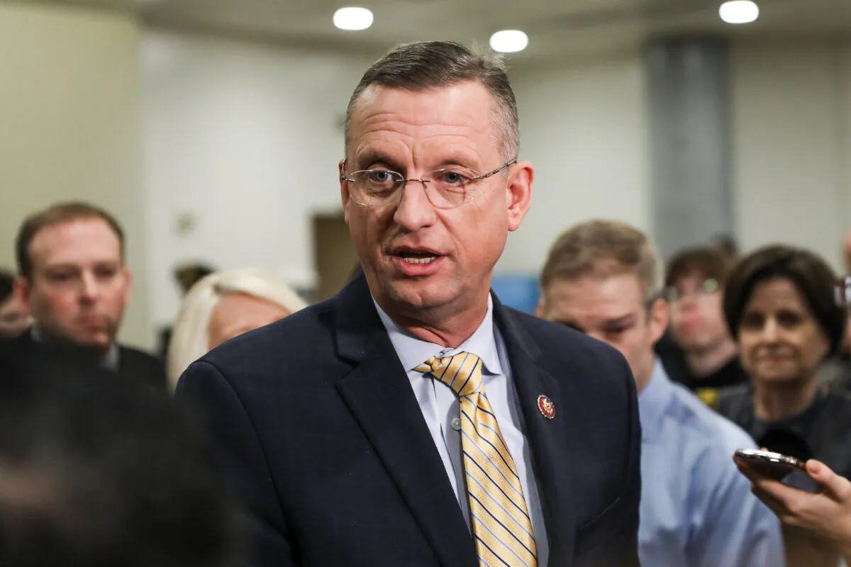  Rep. Doug Collins (R-Ga.) speaks to media while other impeachment defense team advisors look on, at the Capitol in Washington on Jan. 27, 2020. (Charlotte Cuthbertson/The Epoch Times)