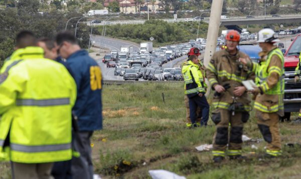 Southbound traffic backed up after a bus rolled down an embankment off Interstate 15 in North San Diego County