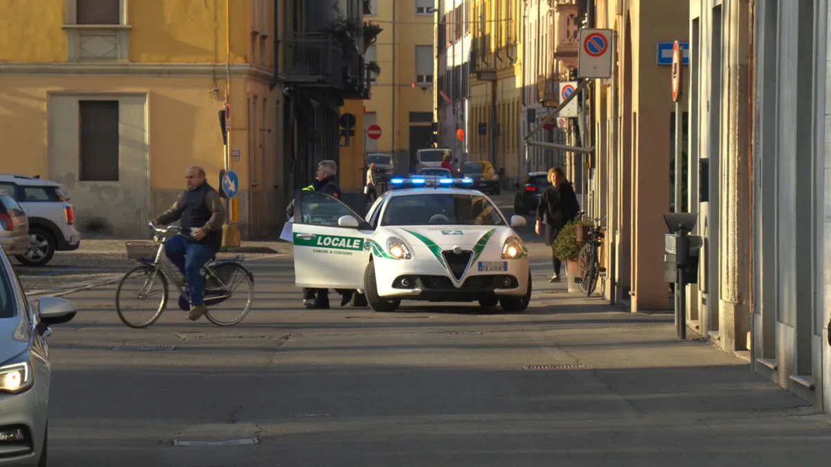 A police car is seen in the village of Codogno after officials told residents to stay home and suspend public activities as 14 cases of coronavirus are confirmed in northern Italy, in this still image taken from video in the province of Lodi, Italy, on Feb. 21, 2020. (Reuters TV)