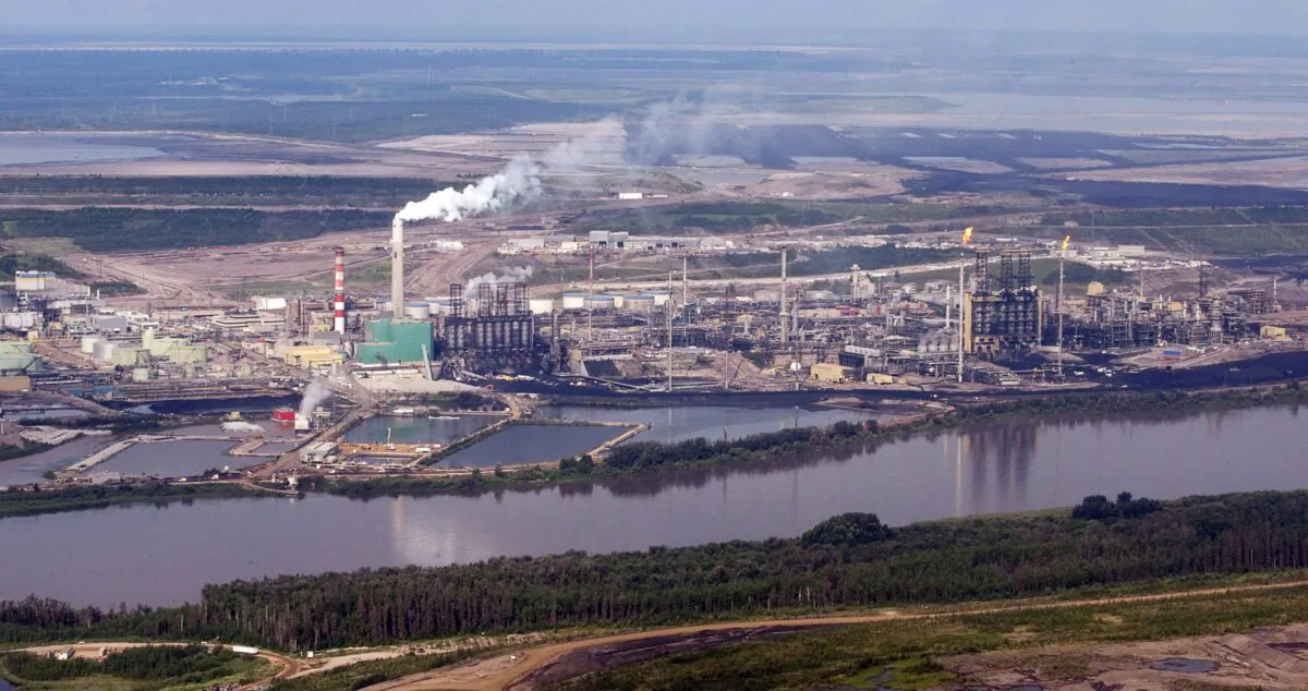 Aerial view of the Suncor mine facility along the Athabasca River near Fort McMurray, Alberta, in a file photo. (The Canadian Press/Jeff McIntosh)
