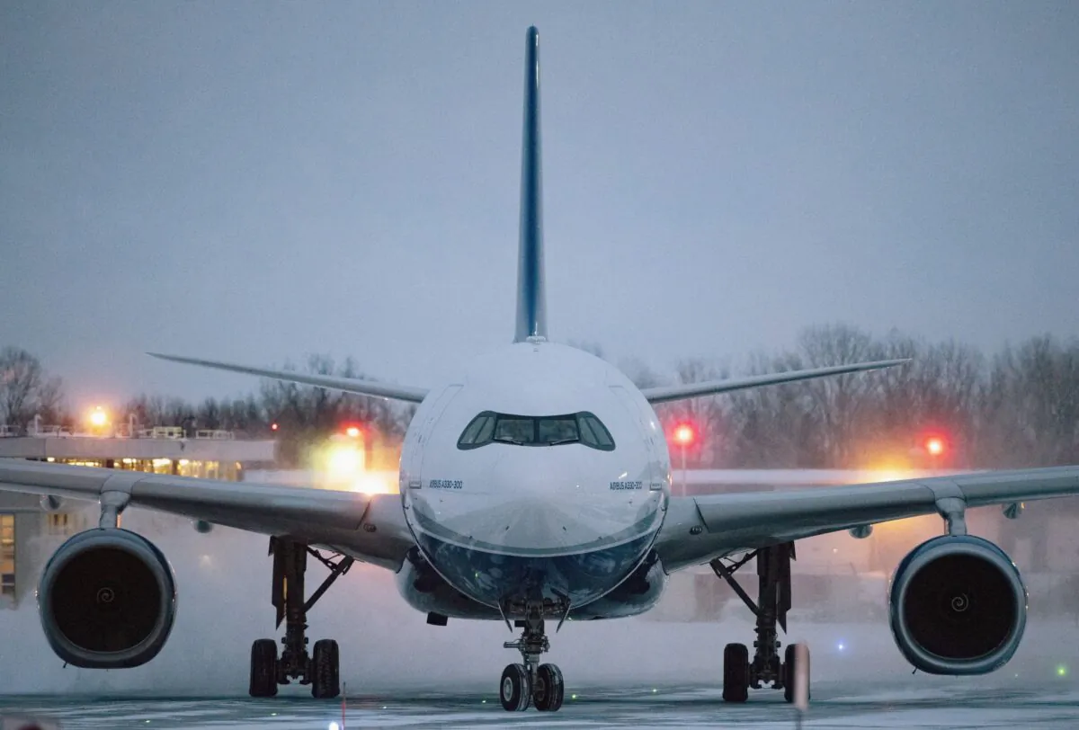 A plane carrying 176 Canadian citizens from the centre of the global novel coronavirus outbreak in Wuhan, China, arrives at CFB Trenton, in Trenton, Ont., on Friday, Feb. 7, 2020. The Canadian Press/Justin Tang
