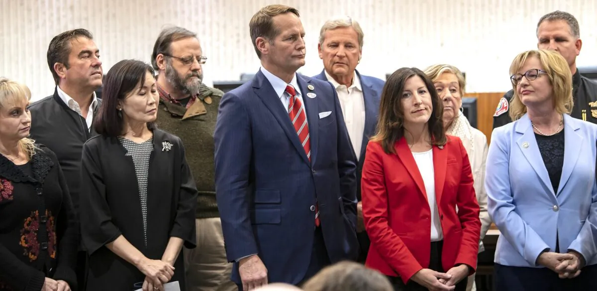 A group of officials including member of the Orange County Board of Supervisors Michele Park Steele, from third left, Rep. Harley Rouda, Assemblywoman Cottie Petrie-Norris and Costa Mesa Mayor Katrina Foley, hold a news conference in Costa Mesa, Calif., on Feb. 22, 2020. (Mindy Schauer/The Orange County Register via AP)