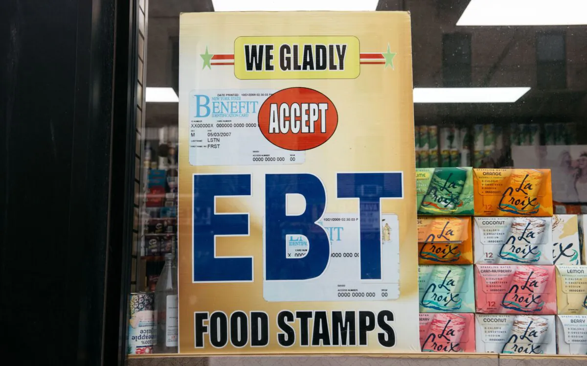 A sign alerting customers about SNAP food stamps benefits is displayed at a grocery store in New York on Dec. 5, 2019. (Scott Heins/Getty Images)