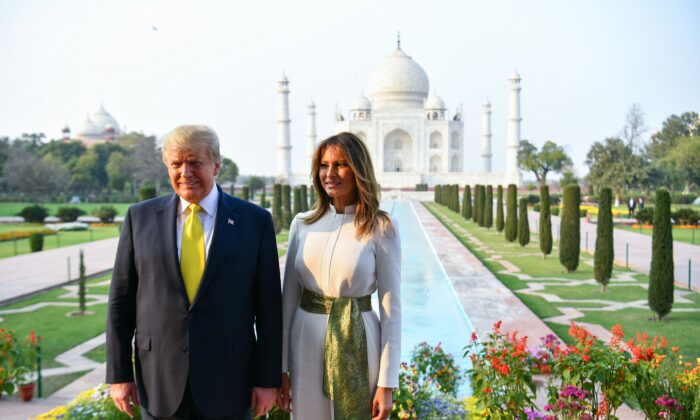 U.S. President Donald Trump and First Lady Melania Trump pose as they visit the Taj Mahal in Agra, India, on Feb. 24, 2020. (Mandel Ngan/AFP via Getty Images)