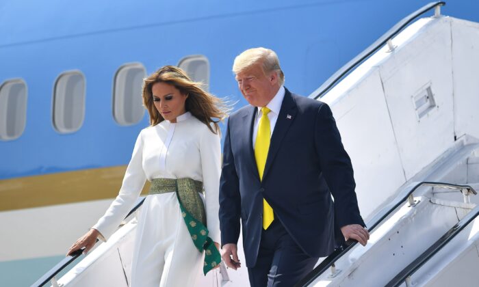 U.S. President Donald Trump and First Lady Melania Trump disembark from Air Force One at Sardar Vallabhbhai Patel International Airport in Ahmedabad, India, on Feb. 24, 2020. (Mandel Ngan/AFP via Getty Images)