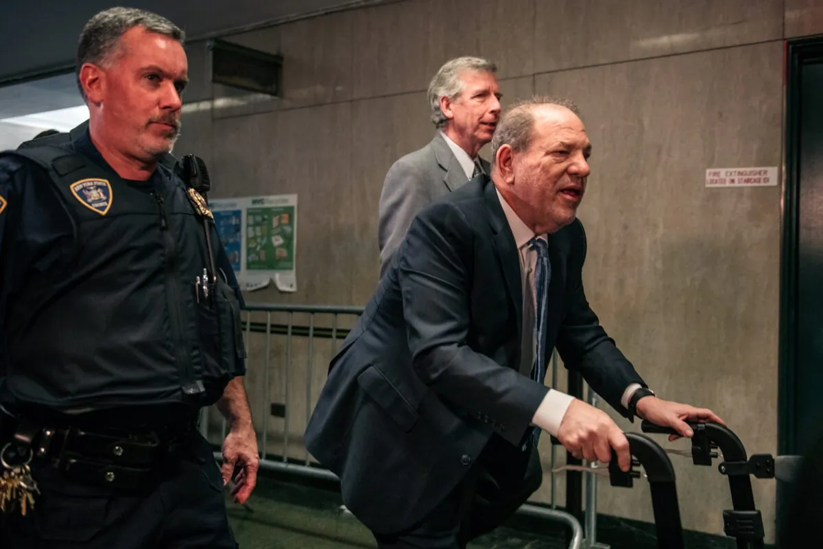 Movie producer Harvey Weinstein (R) enters New York City Criminal Court in New York City on Feb. 24, 2020. (Scott Heins/Getty Images)