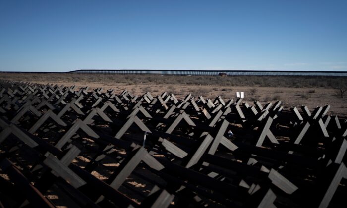 Sections of newly completed border wall is pictured behind the previously used Normandy fencing in Dona Ana County, New Mexico, on Feb. 13, 2020. (Paul Ratje/AFP via Getty Images)