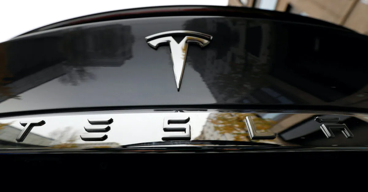 The company logo is pictured on a Tesla Model X electric car in Berlin, Germany, on Nov. 13, 2019.    (Fabrizio Bensch/Reuters)