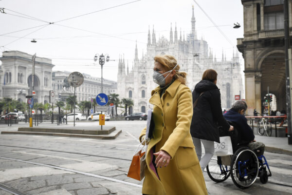 A woman wears a sanitary mask in Italy