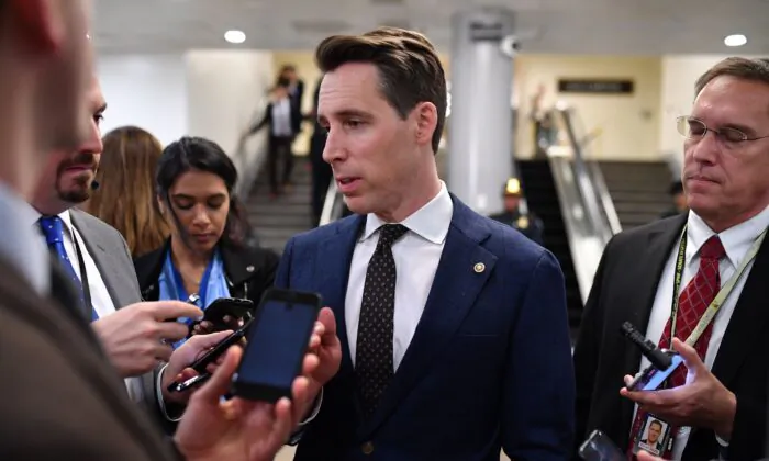 U.S. Sen. Josh Hawley (R-Miss.) speaks to the press during a recess in the impeachment trial at the U.S. Capitol in Washington on Jan. 24, 2020. (Mandel Ngan/AFP via Getty Images)
