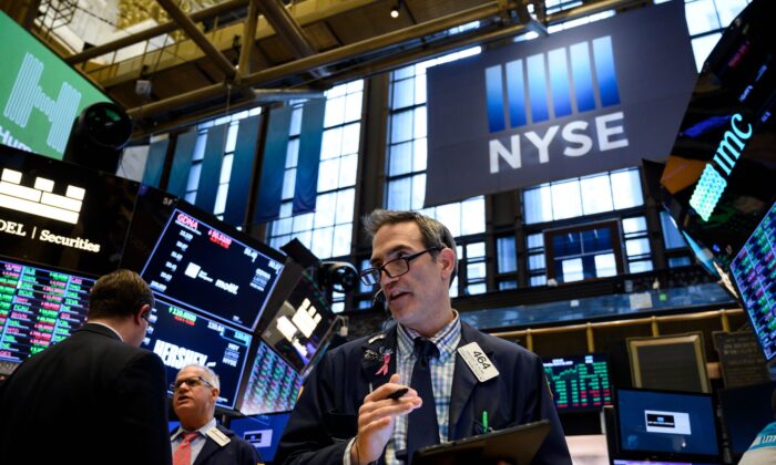 A trader works ahead of the closing bell on the floor of the New York Stock Exchange in New York City on March 18, 2019. (Johannes Eisele/AFP/Getty Images)