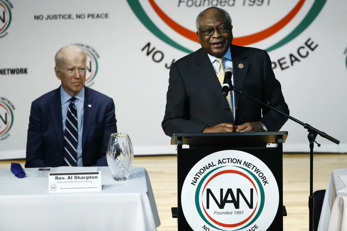 Democratic presidential candidate former Vice President Joe Biden listens to Rep. James Clyburn (D-S.C.) speak at the National Action Network South Carolina Ministers' Breakfast in North Charleston, S.C., on Feb. 26, 2020. (Matt Rourke/AP Photo)