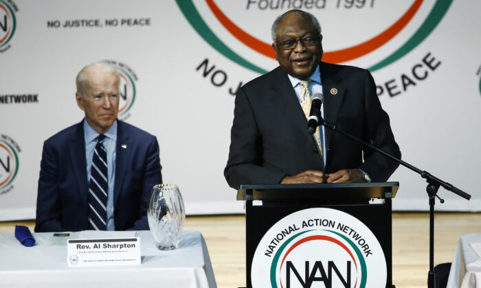 Democratic presidential candidate former Vice President Joe Biden listens to Rep. James Clyburn (D-S.C.) speak at the National Action Network South Carolina Ministers' Breakfast in North Charleston, S.C., on Feb. 26, 2020. (Matt Rourke/AP Photo)