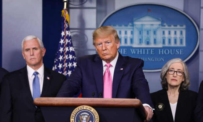 President Donald Trump holds a press conference with health officials and cabinet members about the coronavirus in the White House on Feb. 26, 2020. (Charlotte Cuthbertson/The Epoch Times)