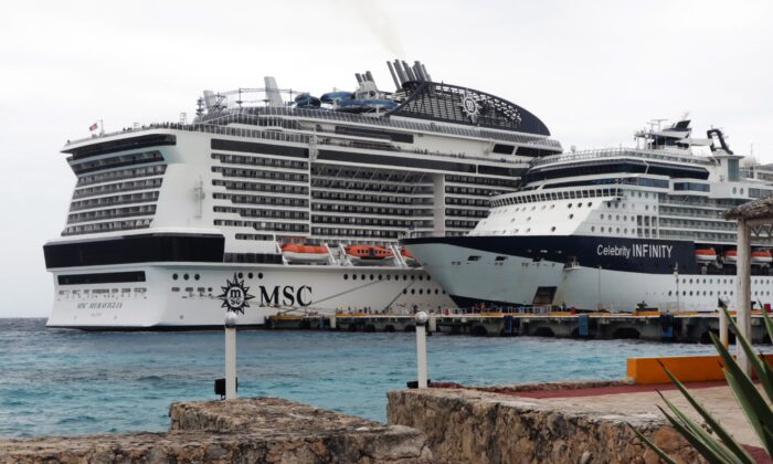 MSC Meraviglia cruise ship (L) is seen in Cozumel, Mexico, on Feb. 27, 2020. (Jose Castillo/AFP via Getty Images)
