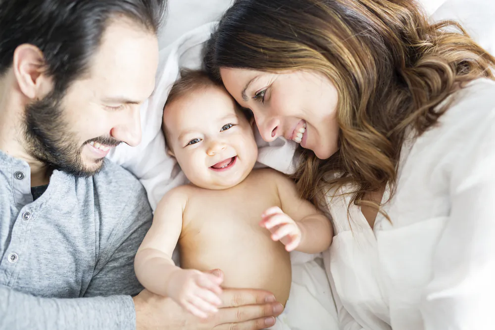 Rein in the temptation to shower your children with too much stuff and opt instead for simple playthings that require imagination, oodles of time in nature, and as few screens as possible. (Lopolo/Shutterstock)