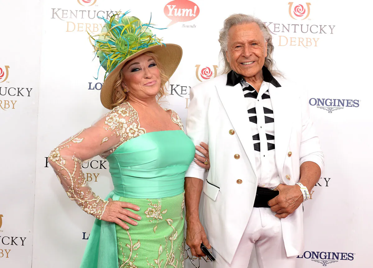 Musician Tanya Tucker (L) and executive Peter Nygard attend the 142nd Kentucky Derby at Churchill Downs on May 07, 2016 in Louisville, Ky. (Gustavo Caballero/Getty Images for Churchill Downs)