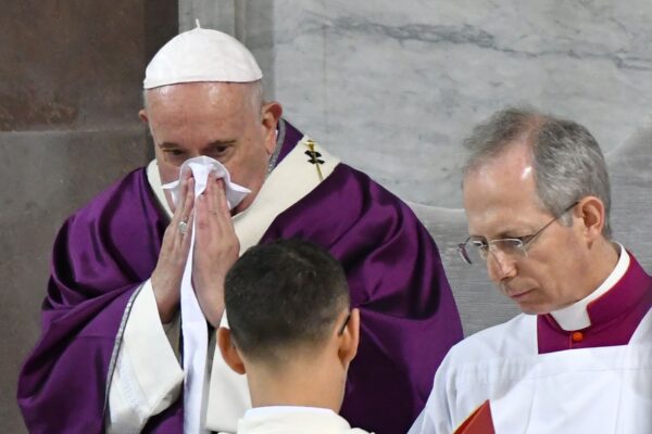 Pope Francis blows his nose