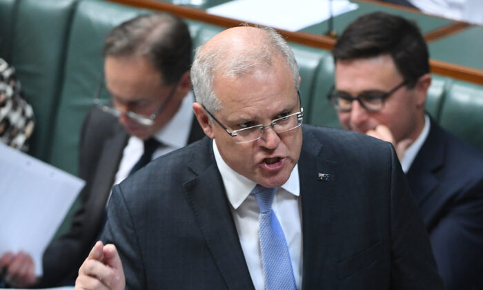 Prime Minister Scott Morrison takes questions from Opposition Leader Anthony Albanese during Question Time in the House of Representatives at Parliament House on Feb. 11, 2020 in Canberra, Australia. (Tracey Nearmy/Getty Images)