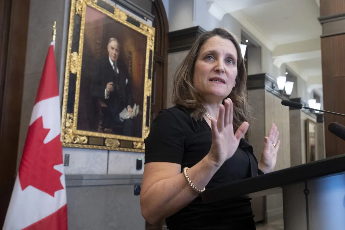 Deputy Prime Minister and Minister of Intergovernmental Affairs Chrystia Freeland speaks with the media about the USMCA trade agreement in the foyer of the House of Commons on Parliament Hill in Ottawa, Canada, on Jan. 27, 2020. (The Canadian Press/Adrian Wyld)