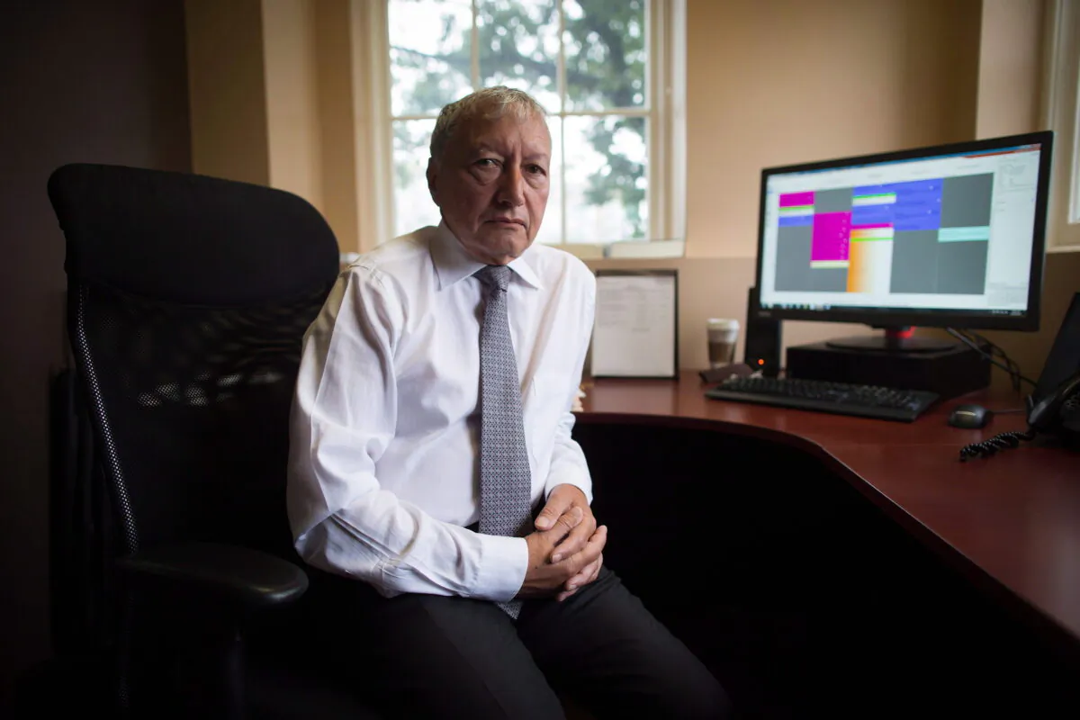 Dr. Brian Day, Medical Director of the Cambie Surgery Centre, sits for a photograph at his office in Vancouver, on Aug. 31, 2016. (Darryl Dyck/the Candian Press)