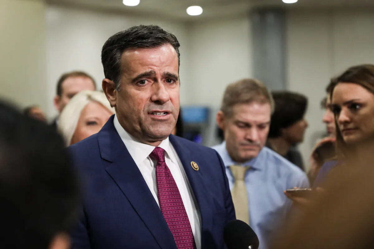 Then-Rep. John Ratcliffe (R-Texas) speaks to media while other impeachment defense team advisers look on, at the Capitol in Washington on Jan. 27, 2020. (Charlotte Cuthbertson/The Epoch Times)