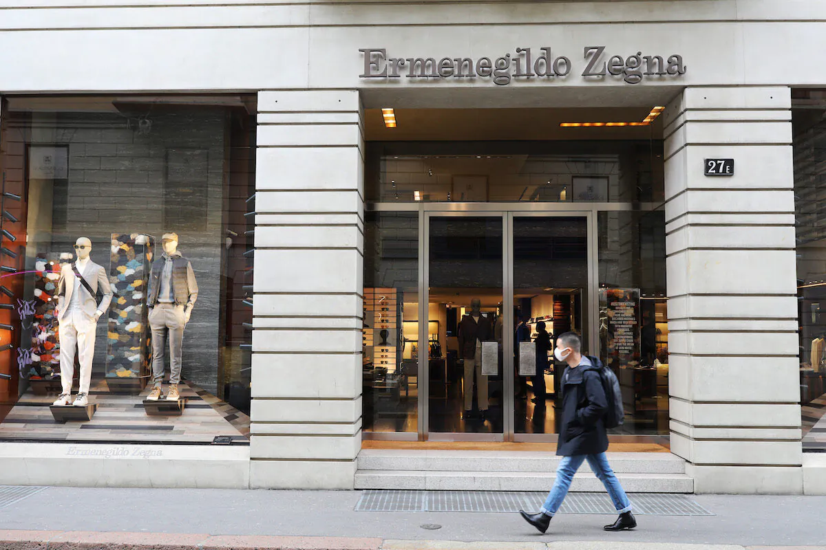 A man wears a protective mask as he walks in front of the Ermenegildo Zegna store in Via Montenapoleone, the most important road of the fashion district in the city center where all the luxury brand are located on February 29, 2020 in Milan, Italy.
Italy registered a surge in coronavirus cases in the last few days with infections remaining centered on outbreaks in two northern regions, Lombardy and Veneto. (Marco Di Lauro/Getty Images)