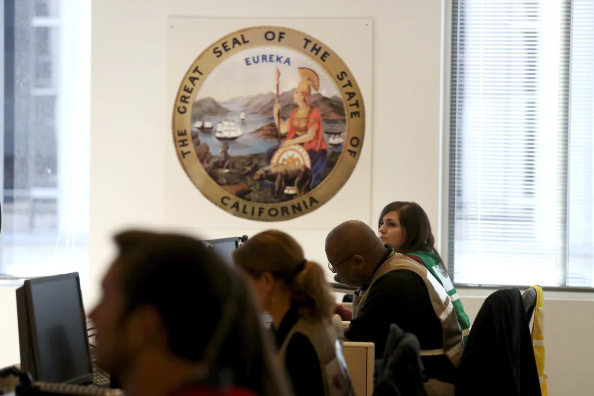 Workers man the Medical Health and Coordination Center at the California Department of Public Health in Sacramento, California on Feb. 27, 2020. (Justin Sullivan/Getty Images)