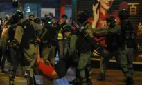 Hong Kong Police Fire Tear Gas as Protesters Return to the Streets