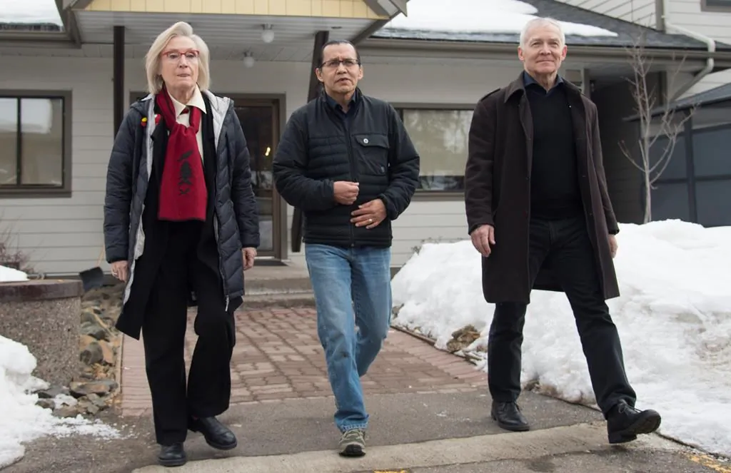 Wet'suwet'en hereditary leader Chief Woos, also known as Frank Alec (C), Minister of Crown-Indigenous Relation, Carolyn Bennett (L), and B.C. Indigenous Relations Minister Scott Fraser arrive to address the media in Smithers, B.C., onMarch 1, 2020. (The Canadian Press/Jonathan Hayward)