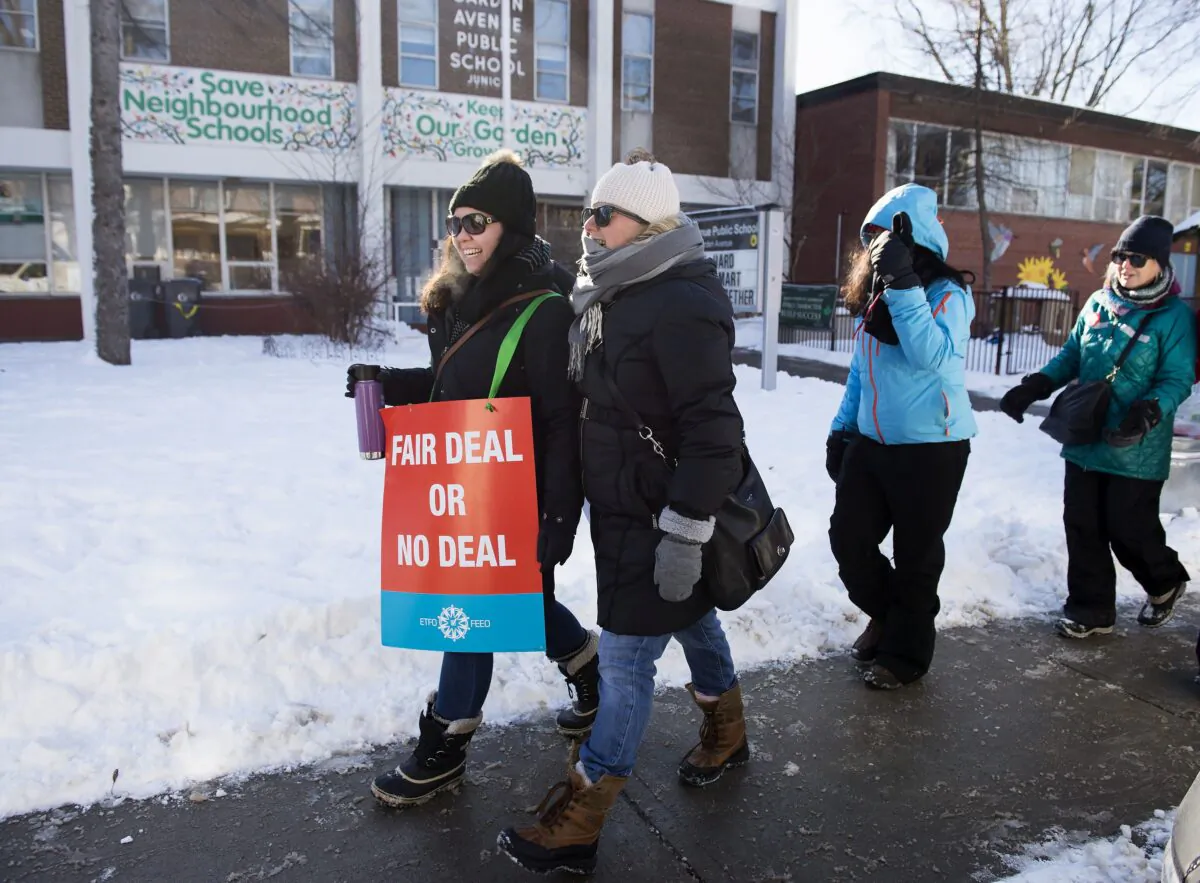 Teachers of the Elementary Teachers' Federation of Ontario participate in a full withdrawal-of-services strike in Toronto on Jan. 20, 2020. (The Canadian Press/Nathan Denette)