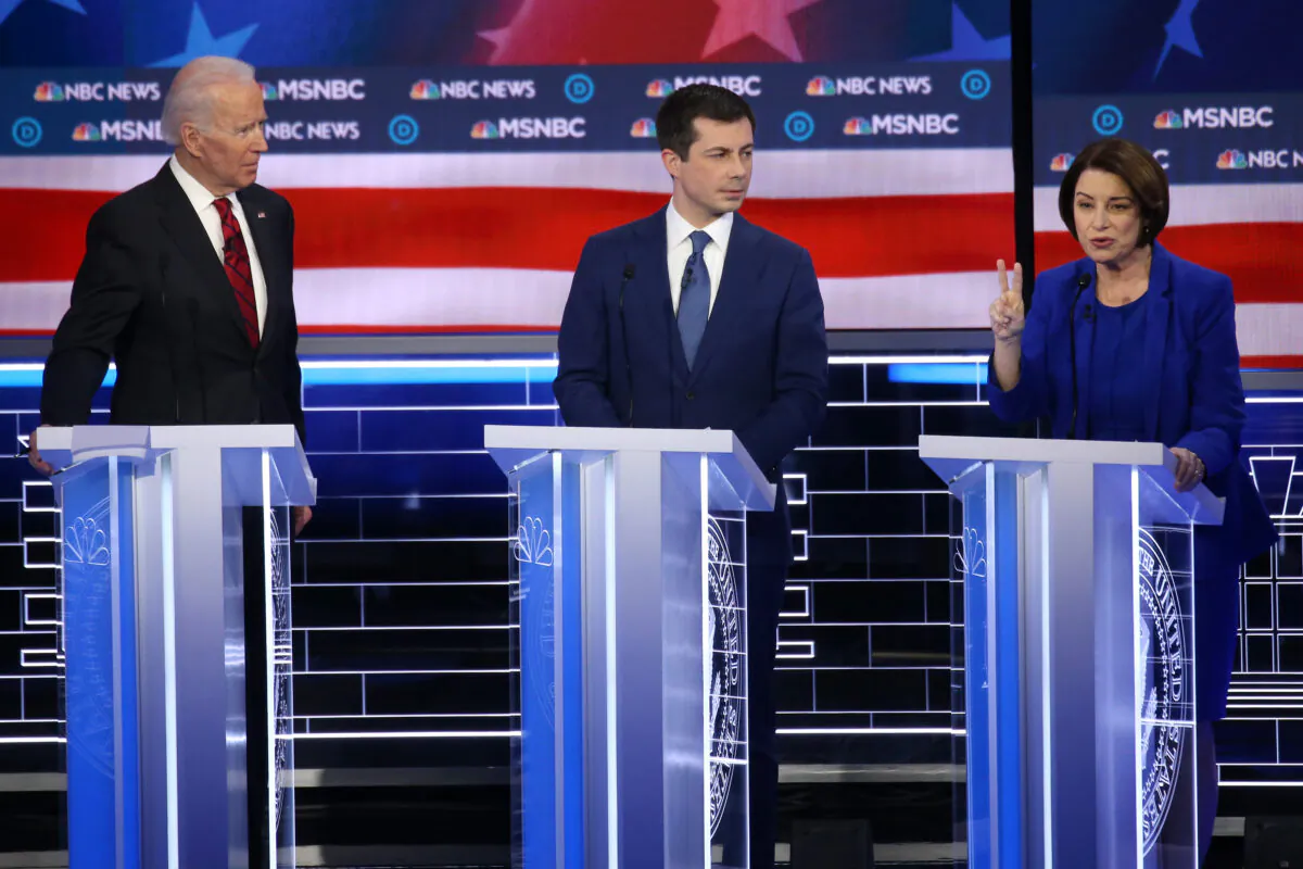 Democratic presidential candidates former Vice President Joe Biden (L) and former South Bend, Indiana, Mayor Pete Buttigieg and Sen. Amy Klobuchar (D-Minn.) participate in the Democratic presidential primary debate at Paris Las Vegas in Las Vegas, Nevada on Feb. 19, 2020. (Mario Tama/Getty Images)