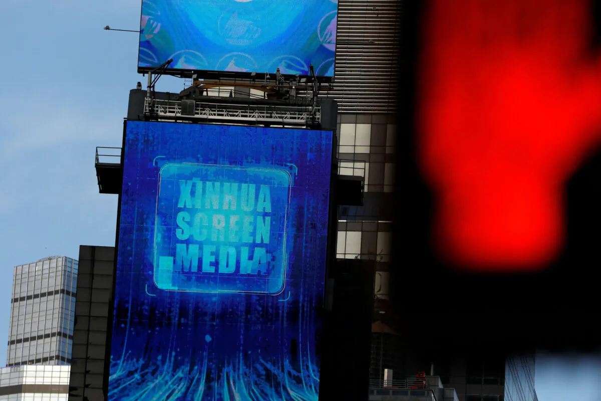 A screen advertising Xinhua News Agency is seen in Times Square in Manhattan, New York City, on March 2, 2020. (Reuters/Andrew Kelly)