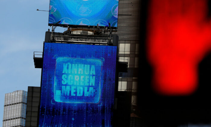 A screen advertising Xinhua News Agency is seen in Times Square in Manhattan, New York City, on March 2, 2020. (Reuters/Andrew Kelly)
