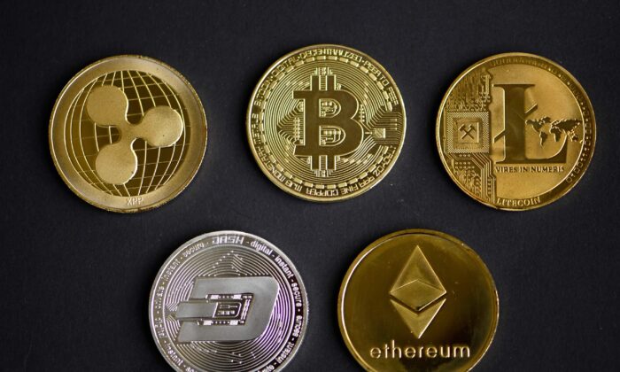 The photo shows physical imitations of cryptocurrency 
 in Dortmund, western Germany, on Jan. 27, 2020. (Ina Fassbender/FP via Getty Images)