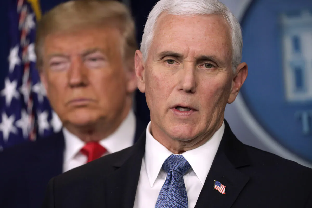 U.S. President Donald Trump listens as Vice President Mike Pence speaks during a news conference at the James Brady Press Briefing Room at the White House on Feb. 29, 2020 in Washington. (Alex Wong/Getty Images)