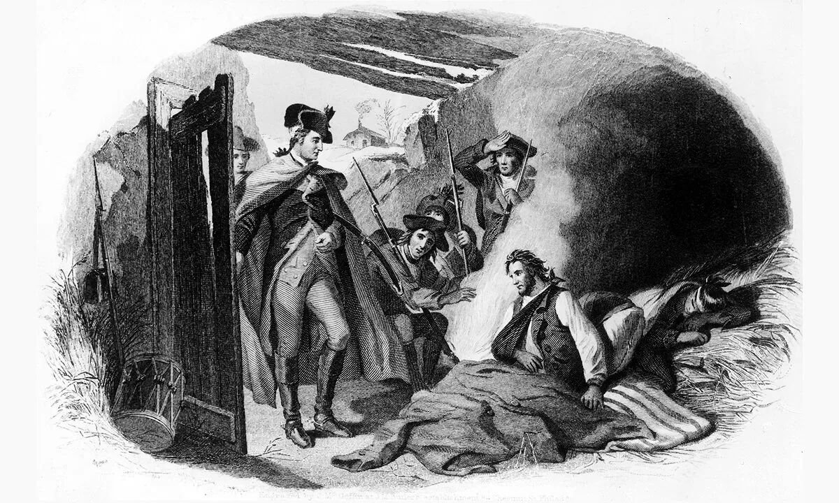 Circa 1782: George Washington (1732-1799) with a wounded soldier at Valley Forge camp where he kept his troops during winter because it enabled him to protect Congress, at York in Pennsylvania, from British attack. (Hulton Archive/Getty Images)