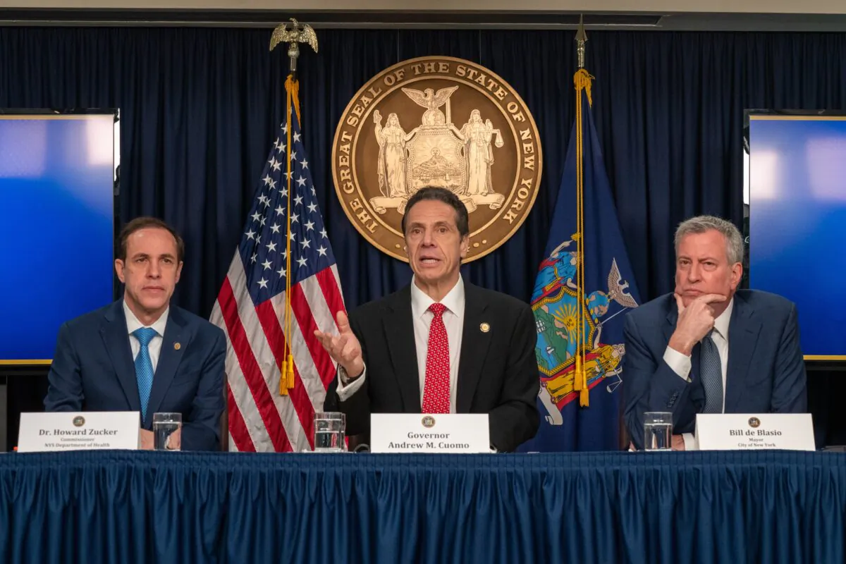 New York state Gov. Andrew Cuomo (C), New York City Mayor Bill DeBlasio (R) and New York state Department of Health Commissioner Howard Zucker hold a news conference on the first confirmed case of COVID-19 in New York, on March 2, 2020. (David Dee Delgado/Getty Images)