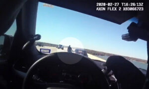 Bodycam Video Shows Police Officer Saving Suicidal Woman About to Jump Off Bridge