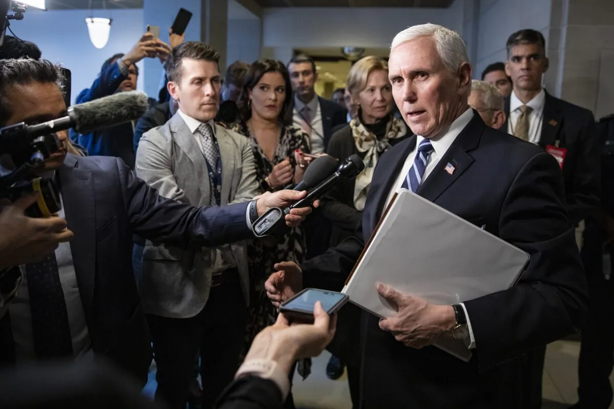U.S. Vice President Mike Pence stops to talk to reporters briefly as he leaves the US Capitol after meeting with Congressional Democrats and Republicans, in separate closed-door meetings, on recent developments with the novel coronavirus, or COVID-19 in Washington, DC on March 4, 2020. (Samuel Corum/Getty Images)